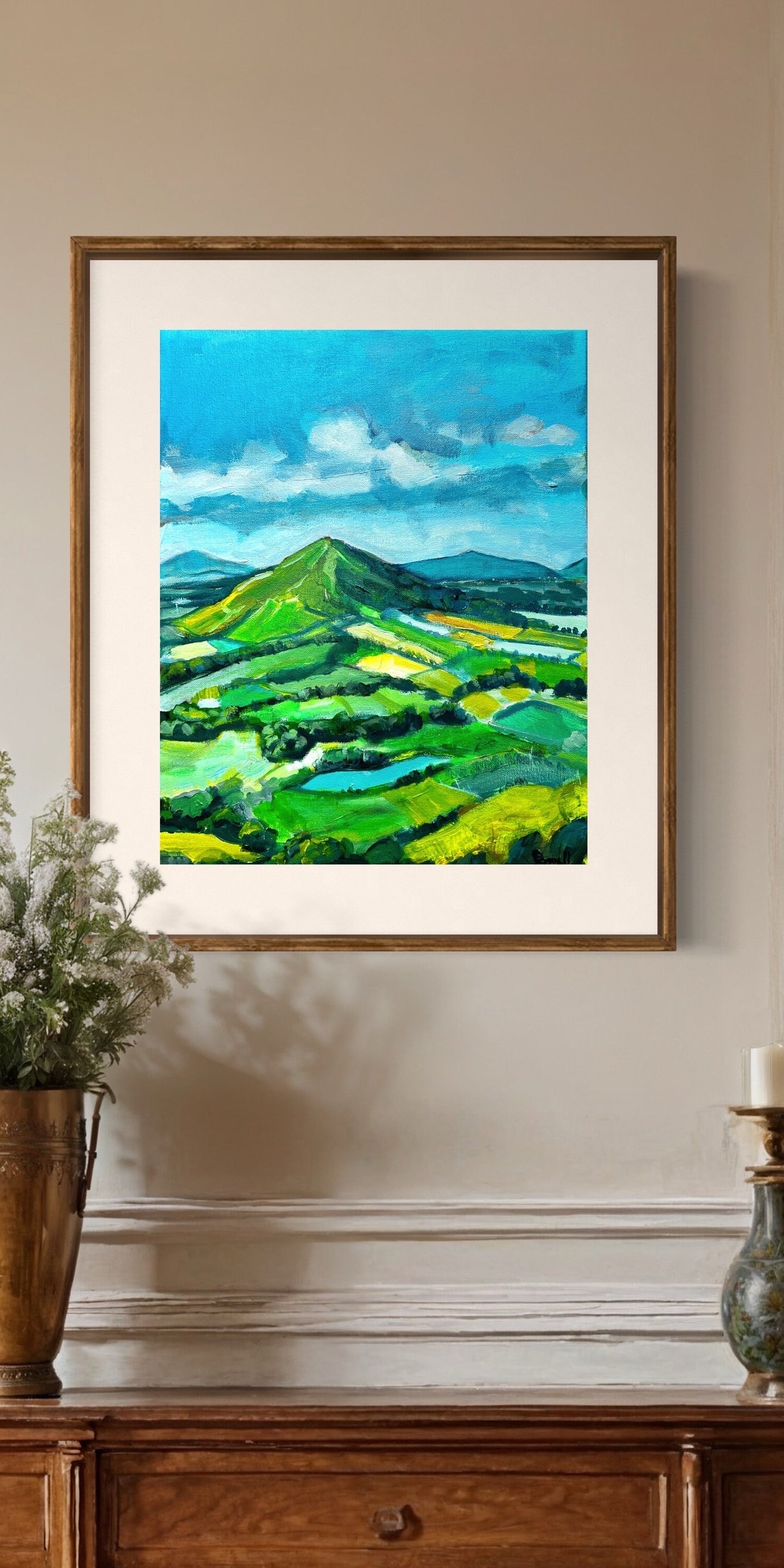 Limited edition of an original painting of Morven Hills in the summer by Margaret powell Worcestershire Artist, in it you could see British camp other hills and Arable land with the summer blue sky with just a hint of clouds