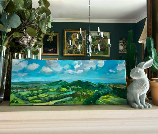 Malvern Hills in July are depicted here in the room setting on the mantelpiece. This smaller size painting makes an ideal gift for Worcestershire lovers and anybody who has been touched by the beauty of Malvern or music of Elgar
Malvern hills original painting