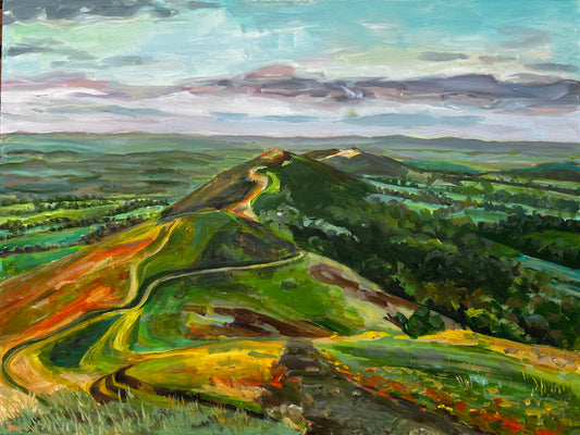 In this 100 cm wide original painting of the Malvern Hills, Worcestershire, the Worcester Artist Margaret Powell has painted the view of Malvern Hill Ridge. Acrylics on canvas.