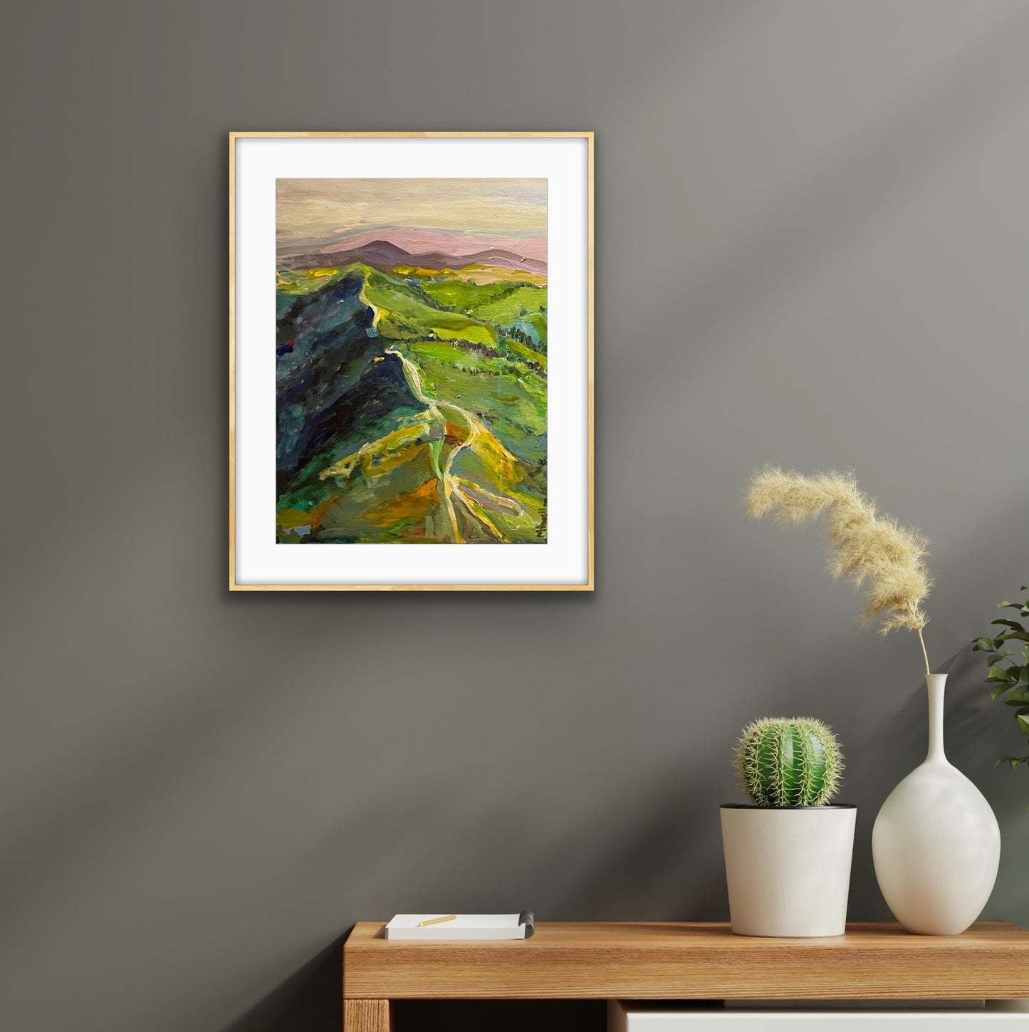 An example of Malvern Hills Rhapsody print with white mount and light coloured frame in a room setting. Other sizes available of these beautiful and well known Worcestershire landscape from an original painting by Margaret powell Worcester Artist.