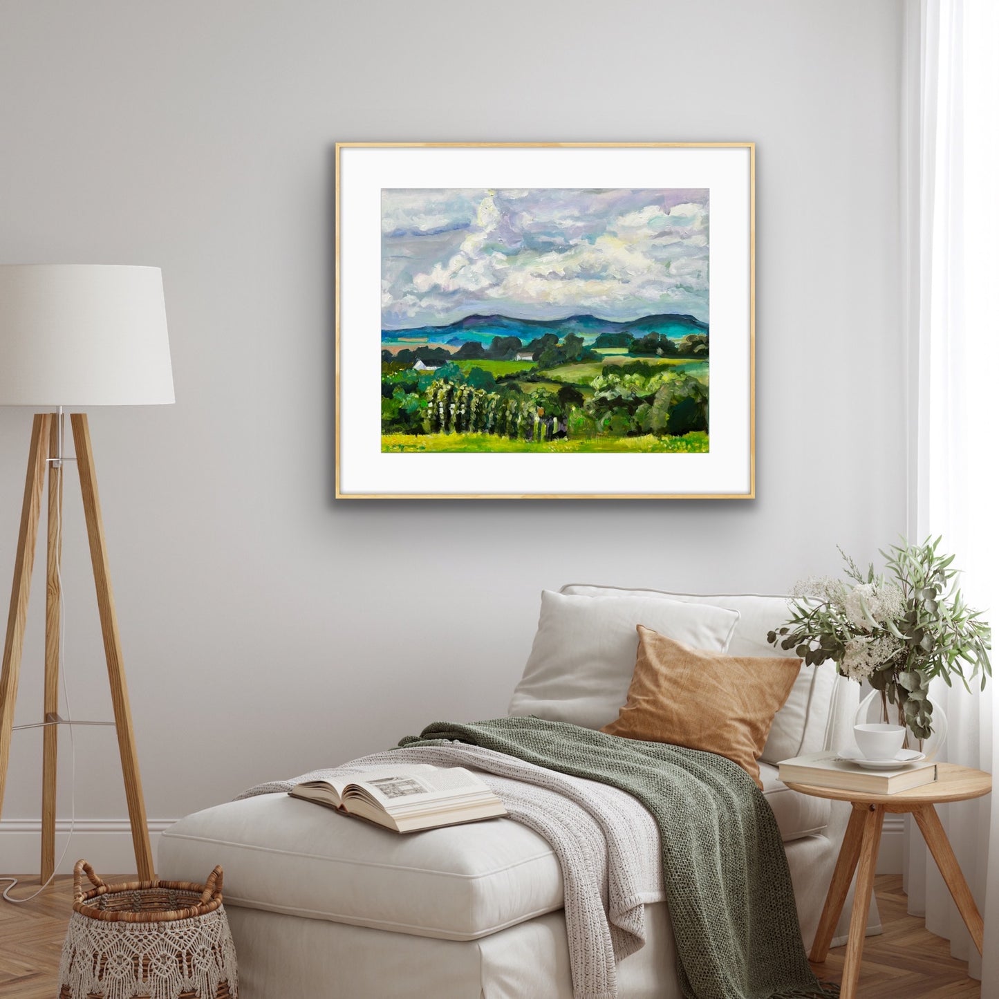 Malvern Hills in May Limited edition print is depicted here in a room setting with a white mound and a thin lightwood frame. Limited edition prints are printed locally in Worcestershire and available to order.