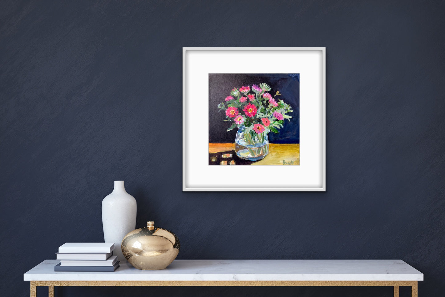 Print of Fine art painting of Asters in the Afternoon Sun by Worcester artist Margaret Powell. Displayed on a dark grey wall in a white frame and mount. White table in foreground.