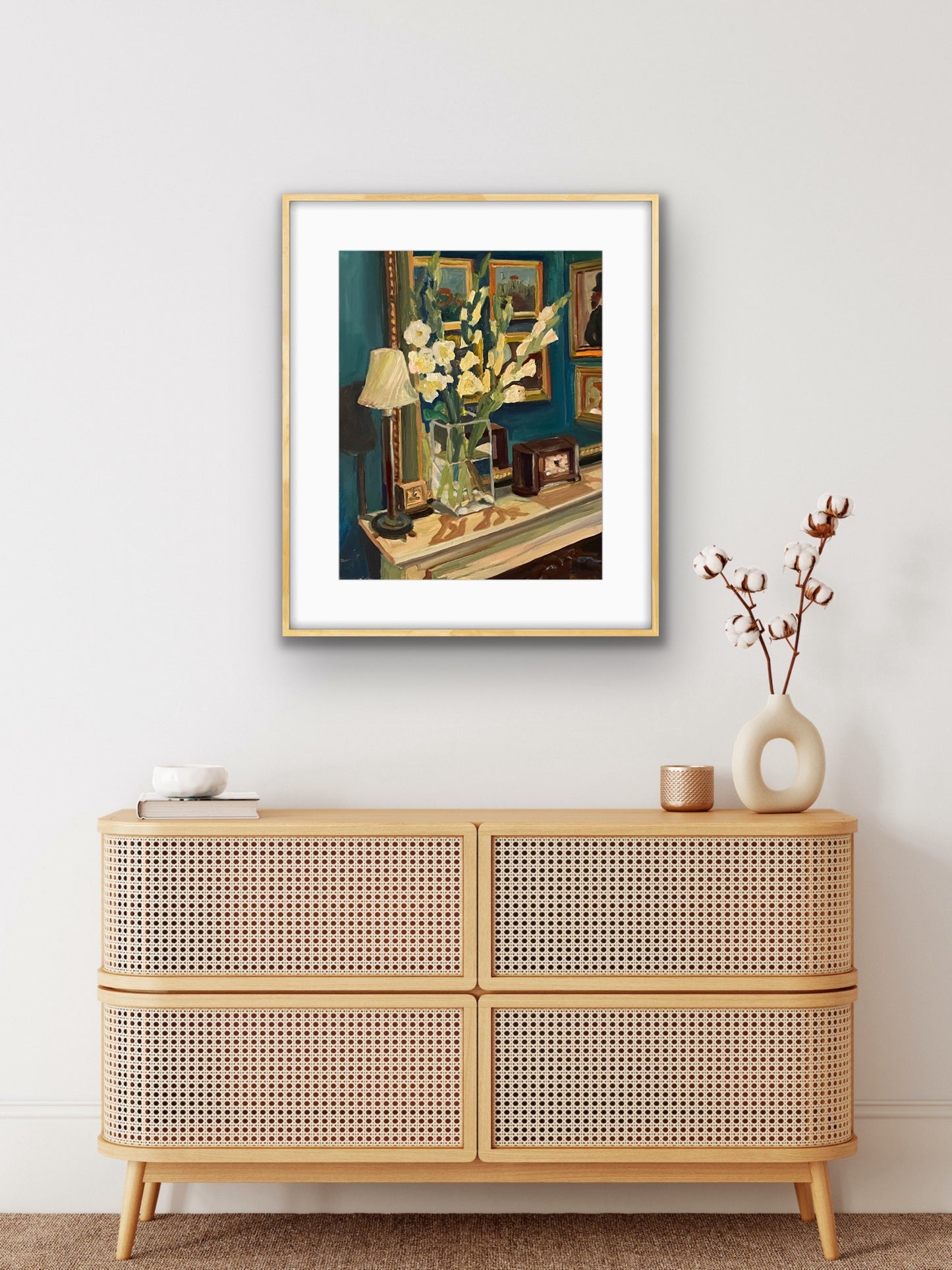 Gladioli in the Dining Room print from original painting by Margaret Powell. Displayed in a light coloured frame with white mount with furniture in front.