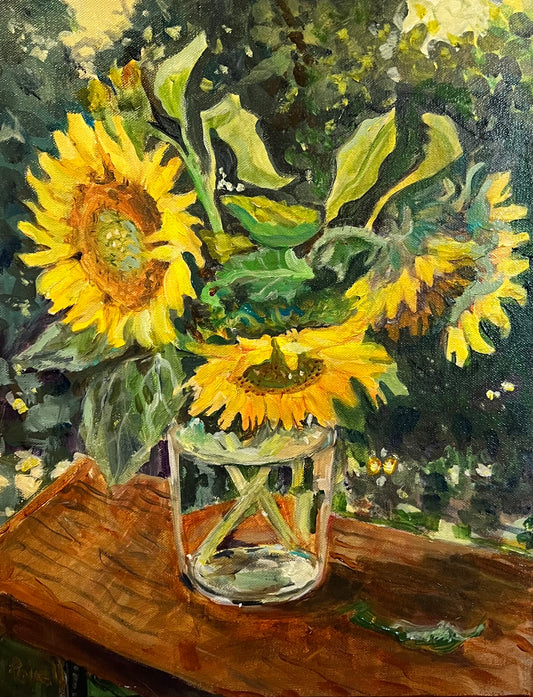 Fine art painting of a vase of sunflowers displayed on a wooden tabletop. By Worcester artist Margaret Powell.