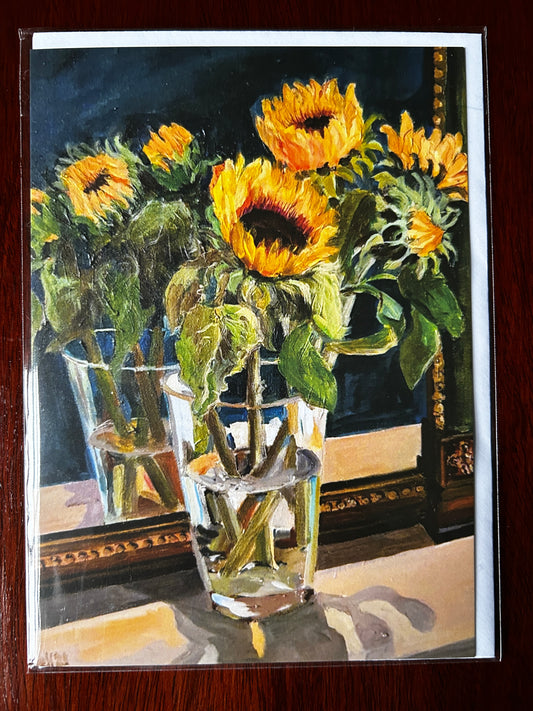 Greetings card depicting a fine art painting of a vase of sunflowers displayed in front of a vintage mirror by Worcester artist Margaret Powell. 