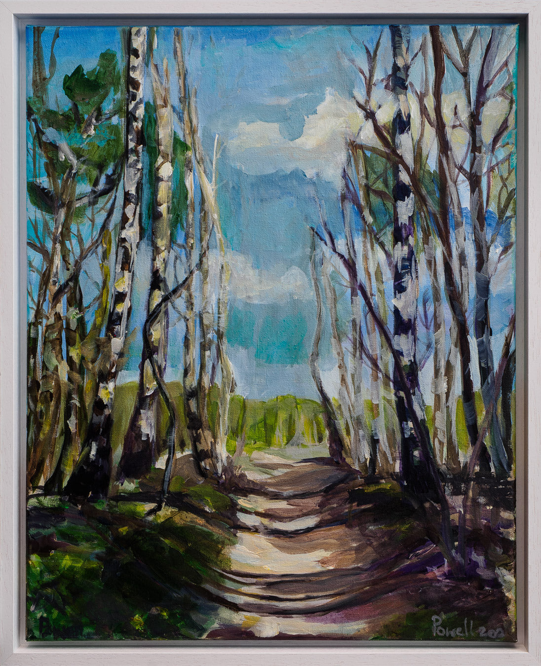 A painting featuring a pathway surrounded by Silver birches with a backdrop of a cloudy sky, showcasing the effects of sunlight and shadows on the landscape.by Margaret Powell Worcestershire artist Margaret Powell