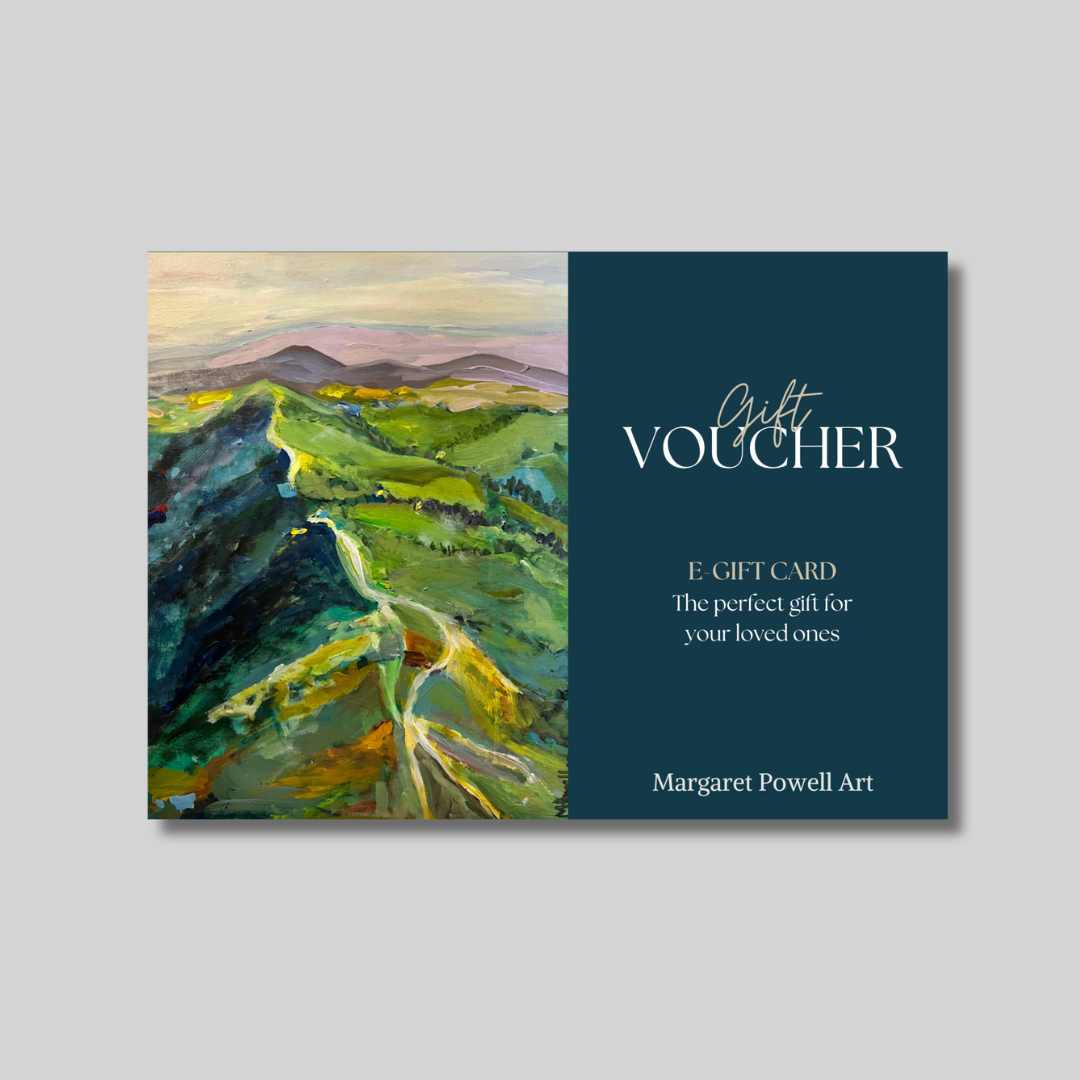 Gift voucher for Worcestershire artist Margaret Powell. Presented with a painting of the Malvern Hills on left hand side and navy blue with white writing on right hand side.
